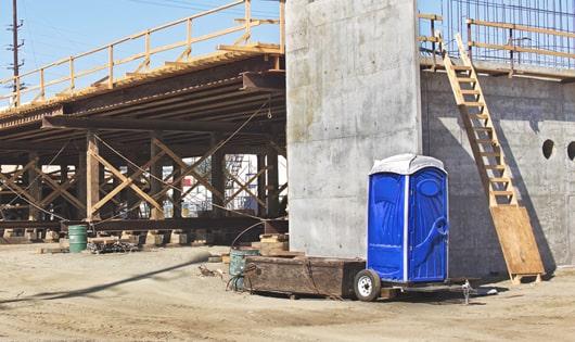 multiple portable toilets arranged for easy access at a work site